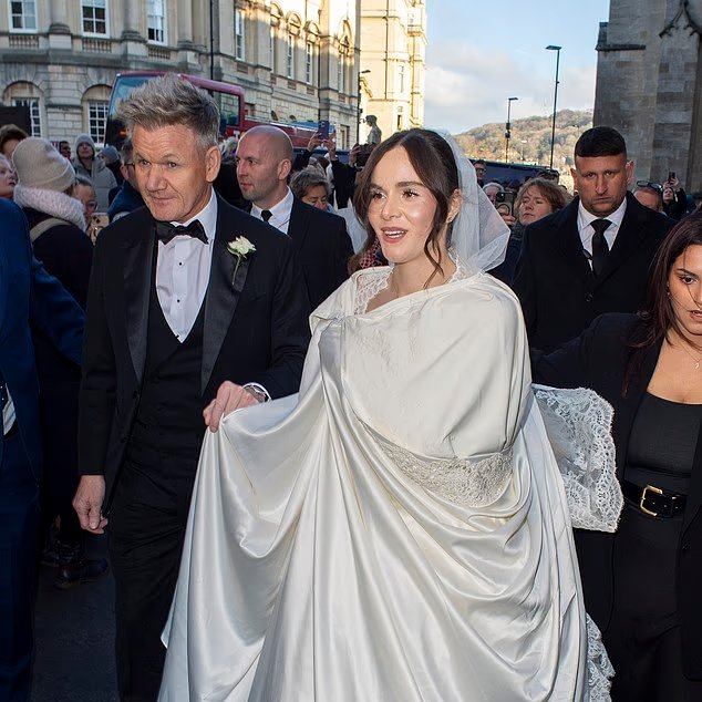 Holly Ramsay arrives at her wedding to Adam Peaty at Bath Abbey with Gordon Ramsay