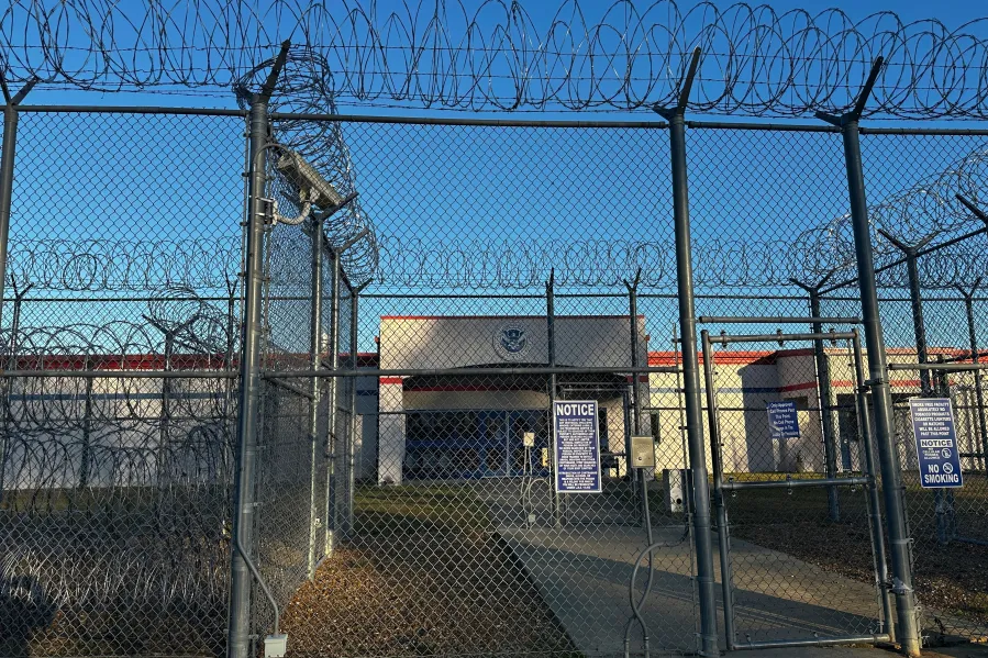 ICE officers outside a US immigration detention facility during enforcement operations