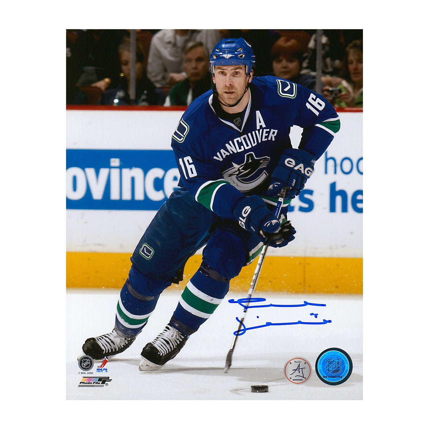 Vancouver Canucks players celebrate during an NHL game