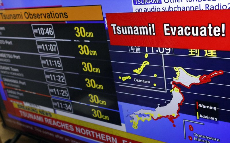 Tsunami alert display after strong earthquake off Japan coast