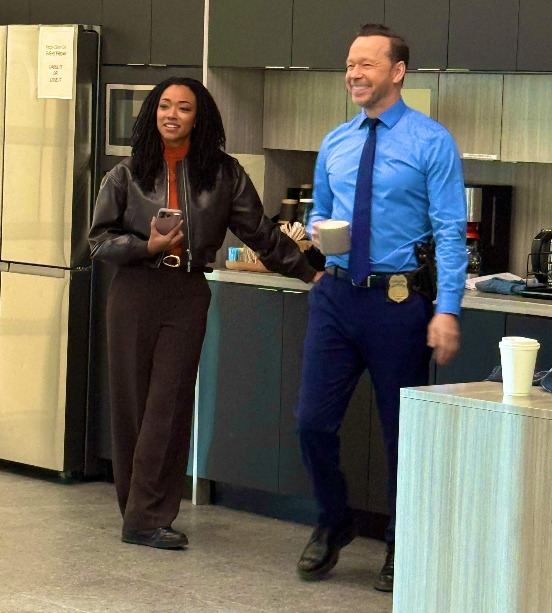 Donnie Wahlberg and Sonequa Martin-Green on the set of Boston Blue