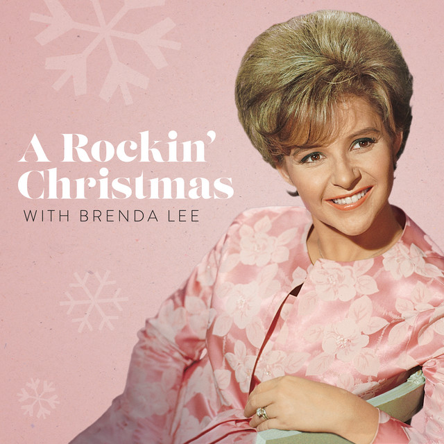 Brenda Lee smiling in a pink floral outfit for a Rockin’ Christmas artwork
