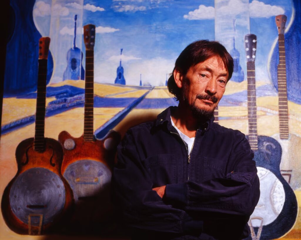 ‘Driving Home for Christmas’ Singer Chris Rea Dies at 74