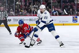 Nikita Kucherov skates with the puck against the Montreal Canadiens