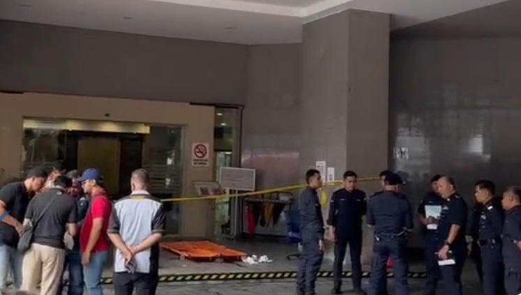 Emergency responders at a Kuala Lumpur private university after an air-conditioning compressor explosion injured several people