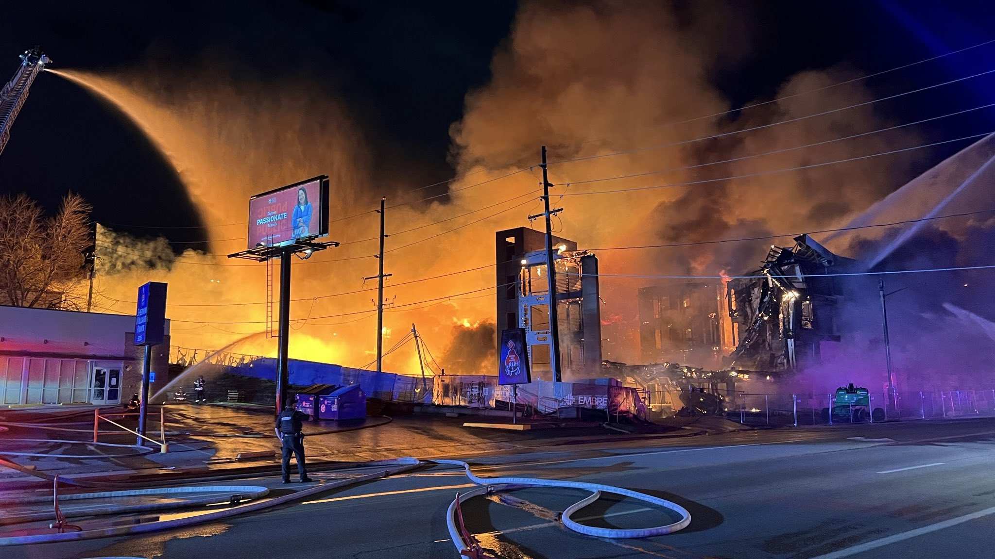 Denver firefighters battle a three-alarm blaze near Leetsdale Drive