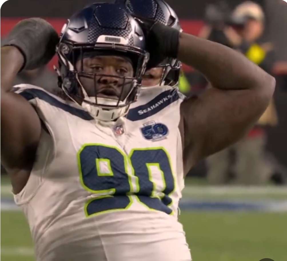 Seahawks defensive tackle Jarran Reed celebrates after sacking Brock Purdy vs 49ers