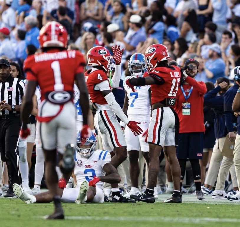 Georgia Bulldogs players celebrate during action against Mississippi in an SEC matchup