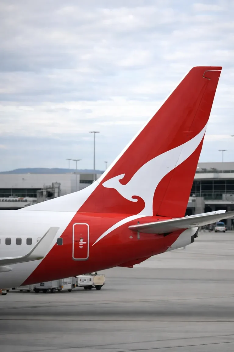 Qantas aircraft tail at airport amid Senate criticism over regional base closures