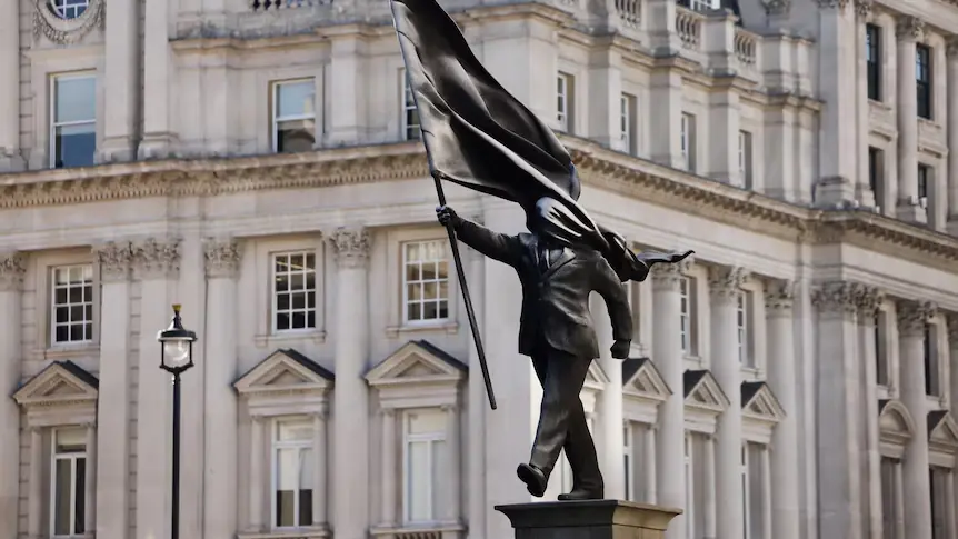 Banksy’s ‘Blinded by Flag’ Statue Installed Overnight in London as Crowds Gather