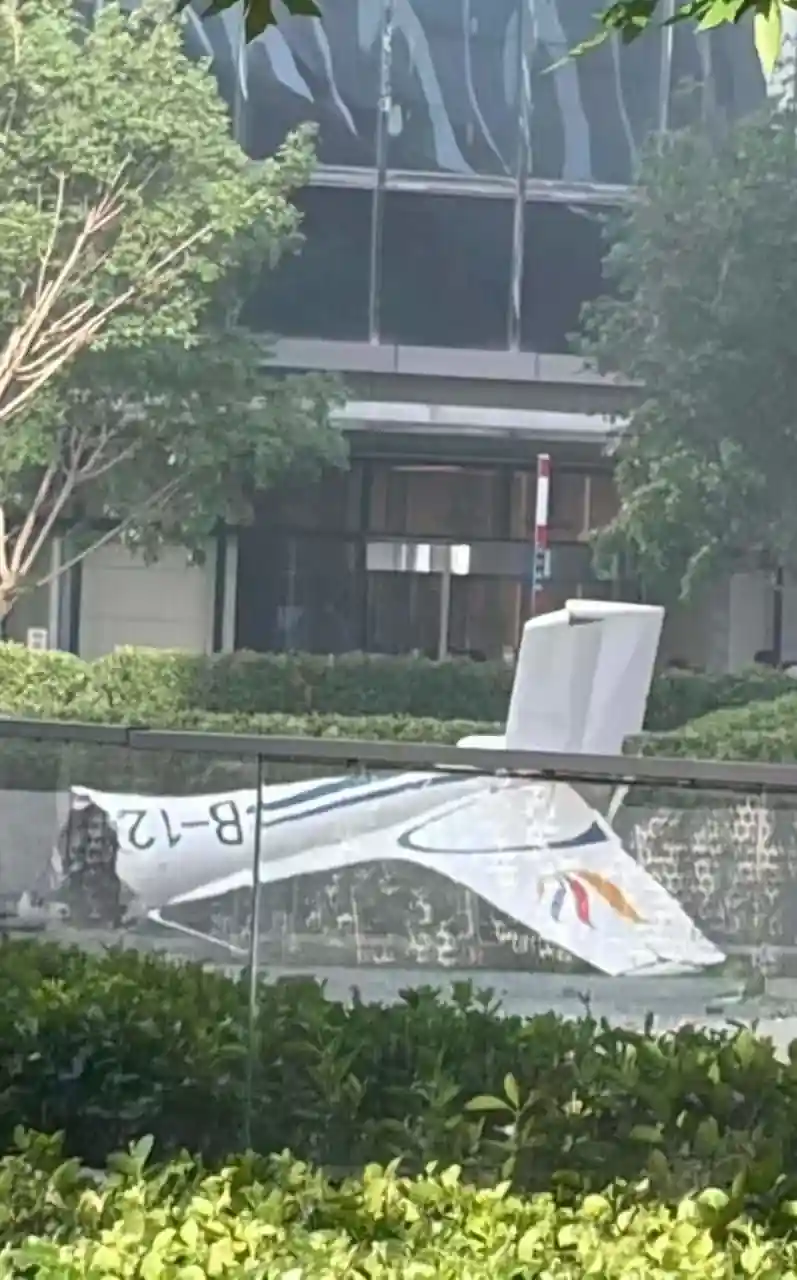 Debris from a small aircraft lies near Beijing's China Zun (CITIC Tower) after the reported plane crash that prompted an emergency response and investigation.