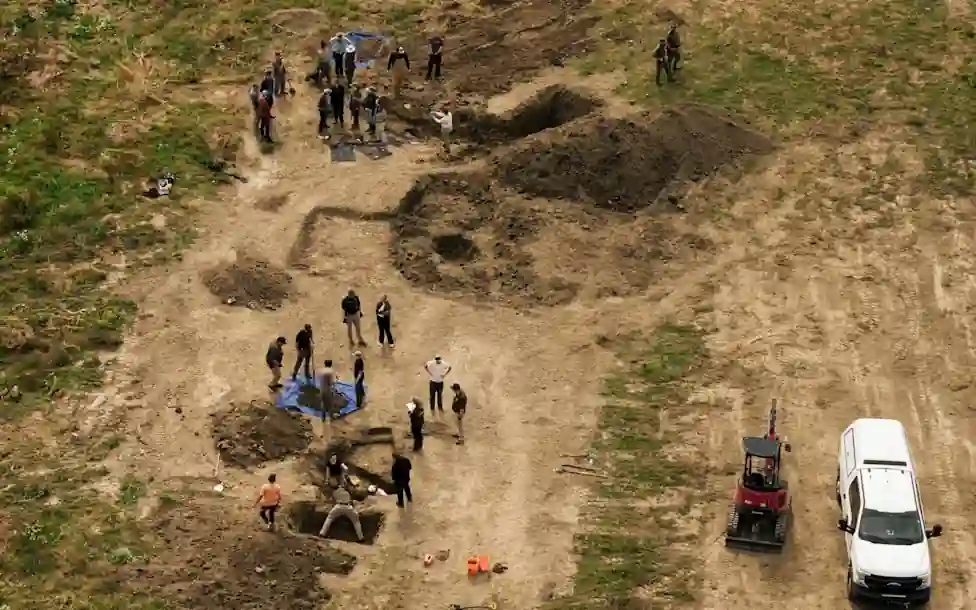 Investigators excavate suspected burial sites at Miranda's Rescue Animal Sanctuary in Humboldt County, California, during an animal cruelty investigation that uncovered the remains of dozens of dogs.