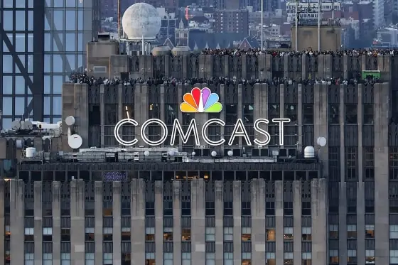 Comcast headquarters in New York City displaying the Comcast logo as the company announces plans to split into two publicly traded companies and spin off NBCUniversal and Sky.