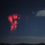 Rare red sprites glowing above thunderstorms over Tibet