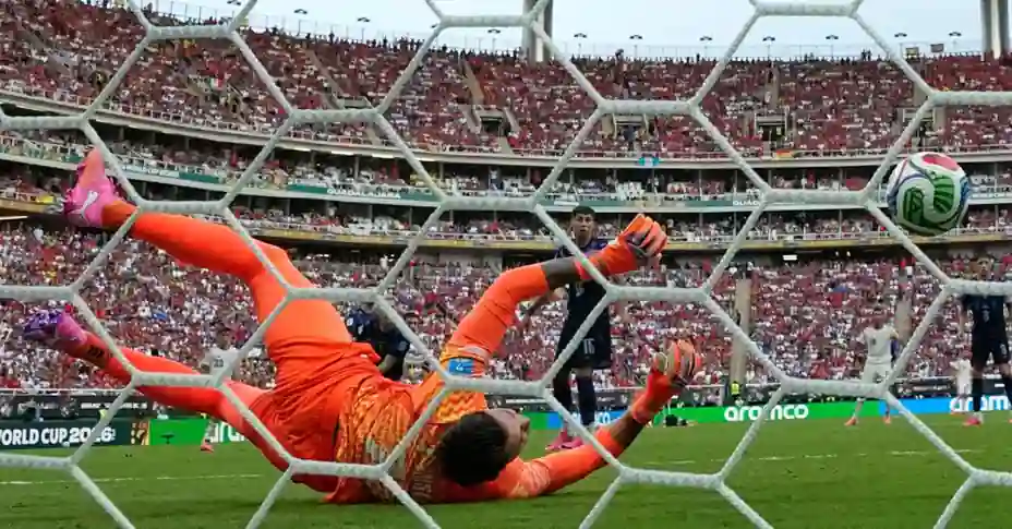 Spain's goalkeeper dives as the ball heads into the net during the FIFA World Cup 2026 group-stage match against Uruguay, the decisive goal that TVNZ viewers missed due to a broadcast interruption on TVNZ+