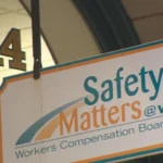Workers Compensation Board of Prince Edward Island office sign displaying "Safety Matters @ Work" outside the WCB building in Charlottetown, P.E.I.