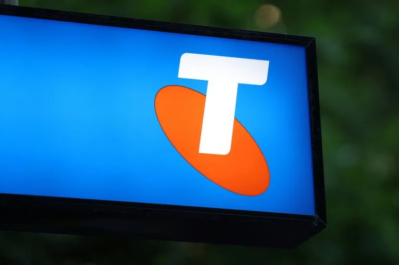 Telstra logo displayed on a blue sign during Australia network outage coverage.