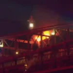 Brooklyn Bridge fire during Macy's Fourth of July fireworks display as FDNY responds in New York City.
