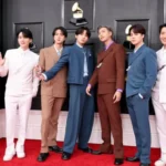 BTS members at a major music awards event amid the 2027 Grammy withdrawal news