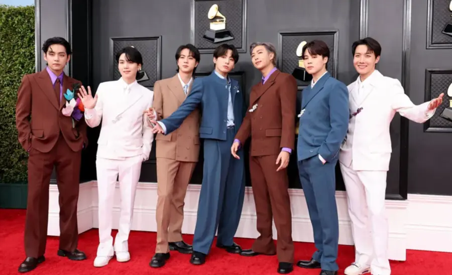 BTS members at a major music awards event amid the 2027 Grammy withdrawal news