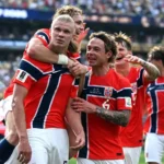 Erling Haaland celebrates with Norway teammates after scoring during Norway's FIFA World Cup 2026 victory over Brazil before the England quarterfinal.