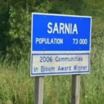 Sarnia welcome sign near Highway 402 as westbound lanes remain closed due to unsafe road conditions and resurfacing work in Ontario