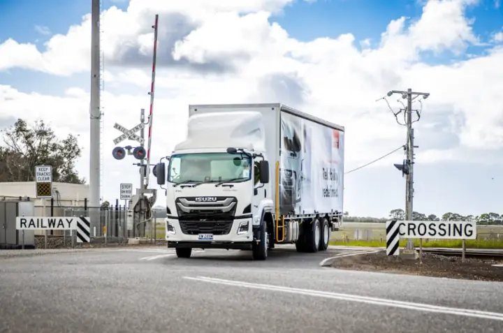 Isuzu F-Series truck undergoing a power-steering recall inspection in Australia