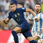 Kylian Mbappé dribbles past Lionel Messi during a France vs Argentina FIFA World Cup match as the 2026 Golden Boot race intensifies.