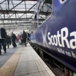 ScotRail train at a busy station as passengers experience problems with the new ticketing app.
