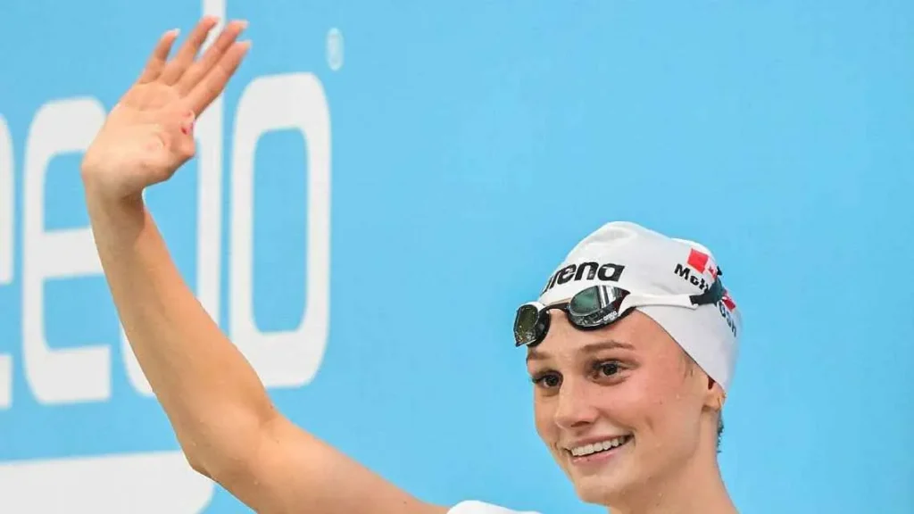 Summer McIntosh celebrates after breaking the 17-year-old women's 200m butterfly world record at the Canadian Swimming Trials in Montrea