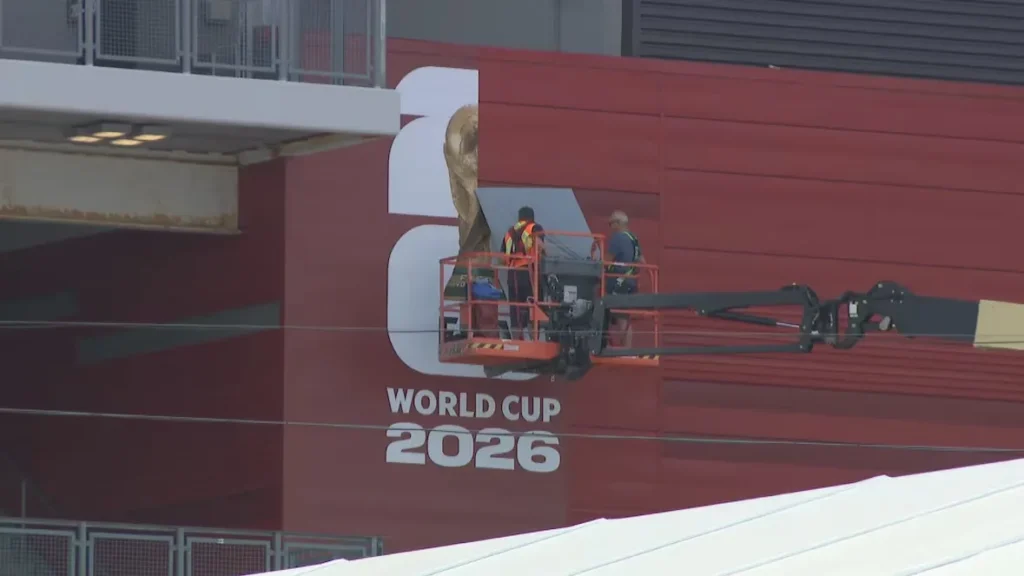 Workers remove FIFA World Cup 2026 branding from Toronto Stadium after the city completed its official hosting duties following six tournament matches.