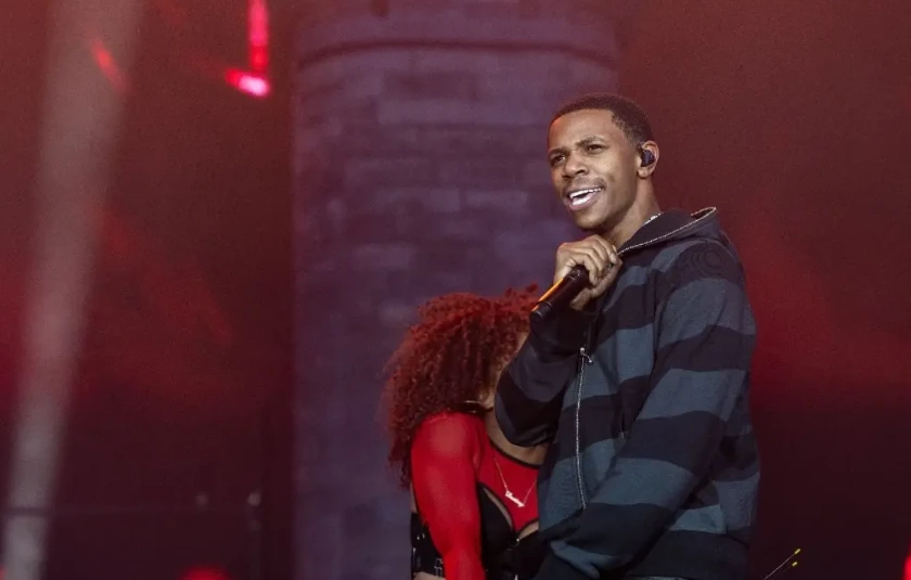 A Boogie Wit da Hoodie performing live on stage during a concert.