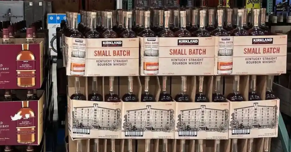 Costco-style Kentucky bourbon whiskey bottles highlighting 2021 vs. 2026 prices