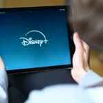 Disney+ displayed on a tablet as Disney and TikTok announce a creator partnership for Marvel, Pixar and Star Wars short-form videos.