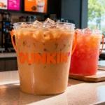 Dunkin’ 48-ounce iced beverage buckets filled with iced coffee and a fruit Refresher.