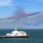 Eastbourne Airshow aircraft performing over Eastbourne seafront and pier