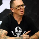 Sid Wilson performing behind turntables during a Slipknot concert