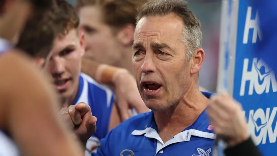 Alastair Clarkson coaching North Melbourne during an AFL match