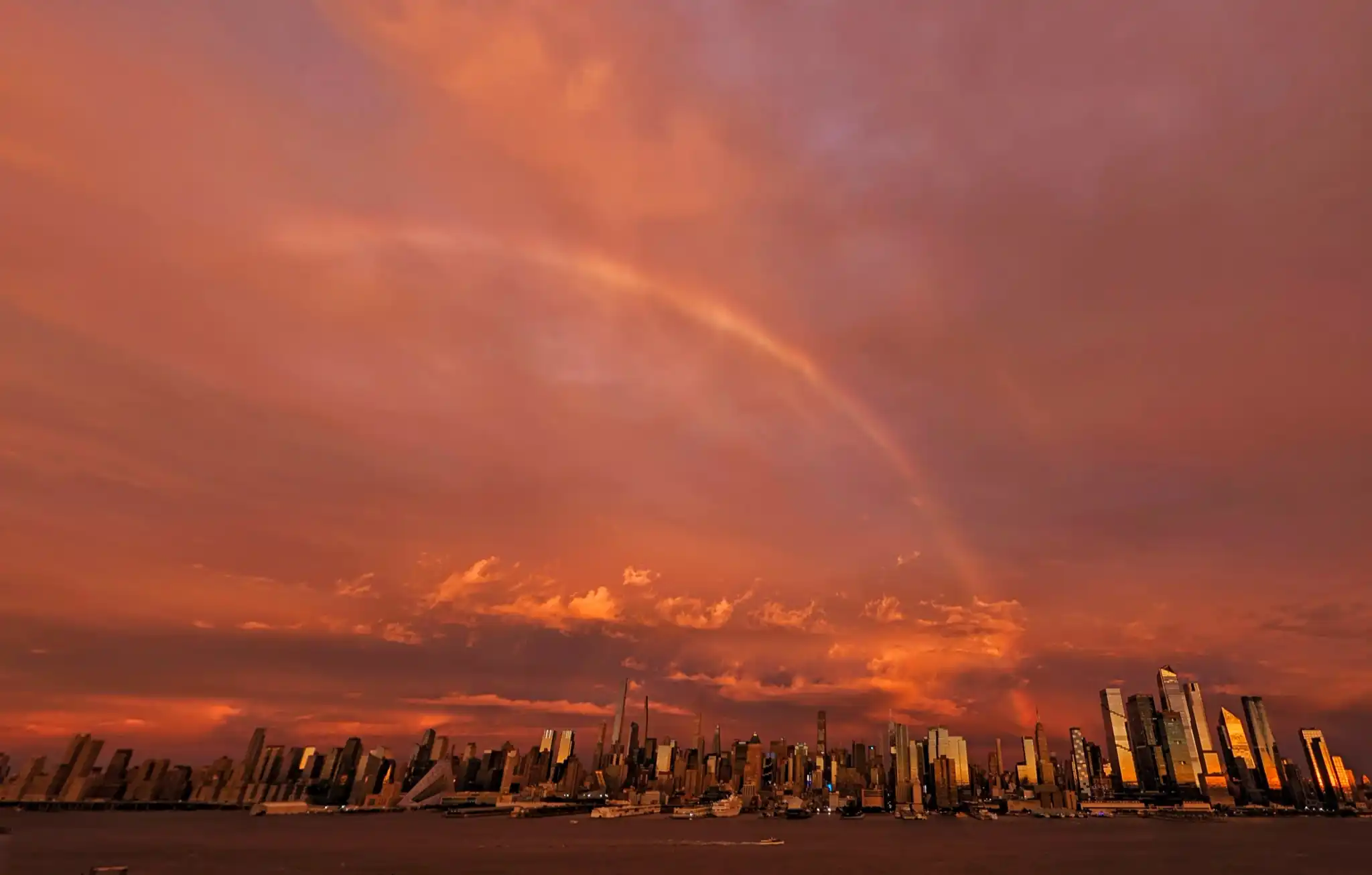 NYC Sky Turns Fiery Red as Nor’easter Closes In With 50 MPH Winds