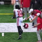 Kip Lewis injury vs Michigan