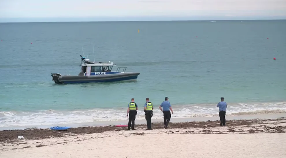 Police search Sorrento Beach near Perth after a suspected shark attack and swimmer disappearance