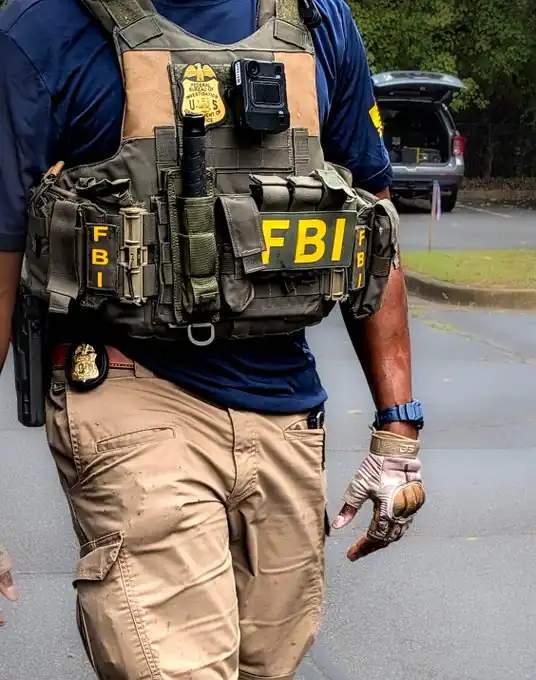 Cherokee High School Shooting Plot: 3 Arrested After FBI Tip, Guns Seized