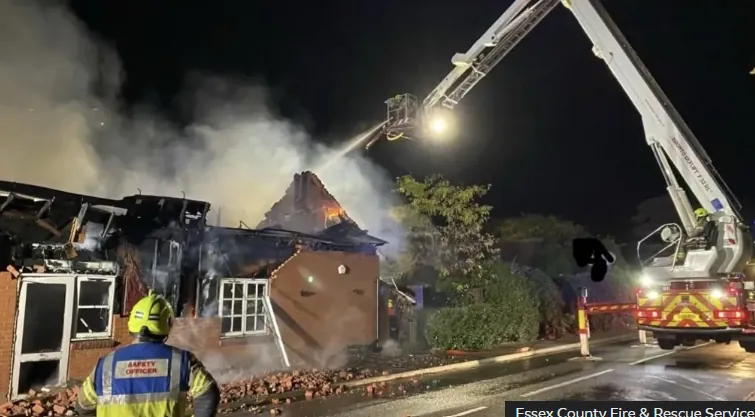 Harvester restaurant in Stanway, Colchester, severely damaged by an overnight fire on October 15, 2026, as firefighters tackle the blaze.